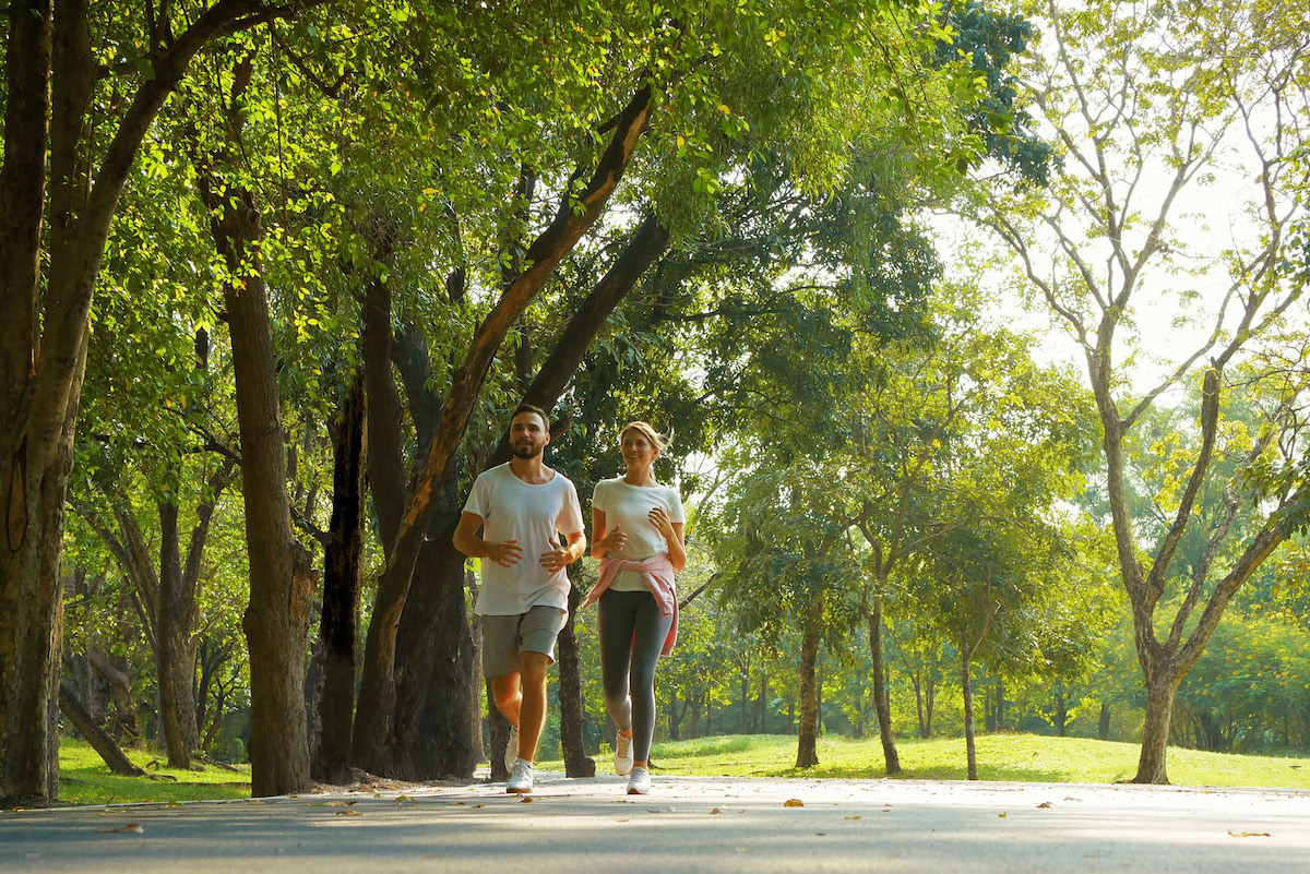 A couple running in the park
